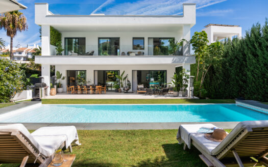 Modern luxury home Villa Gardenias with rooftop terrace, private pool, and elegant garden on the border of Puerto Banus and Nueva Andalucía.