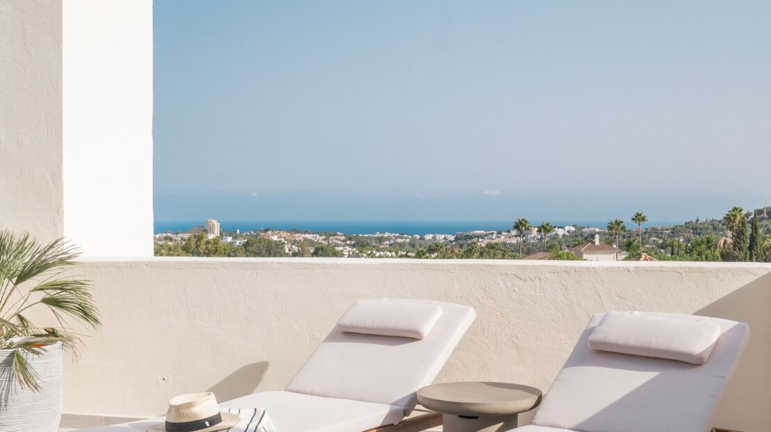 Luxury sunbeds overlooking turquoise Mediterranean waters from Los Belvederes penthouse rooftop, Marbella luxury real estate